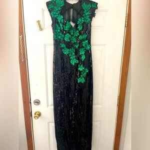 Vintage black and green sequined gown size 8 with keyhole back.